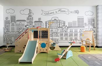 Indoor kids' playroom and outdoor play area